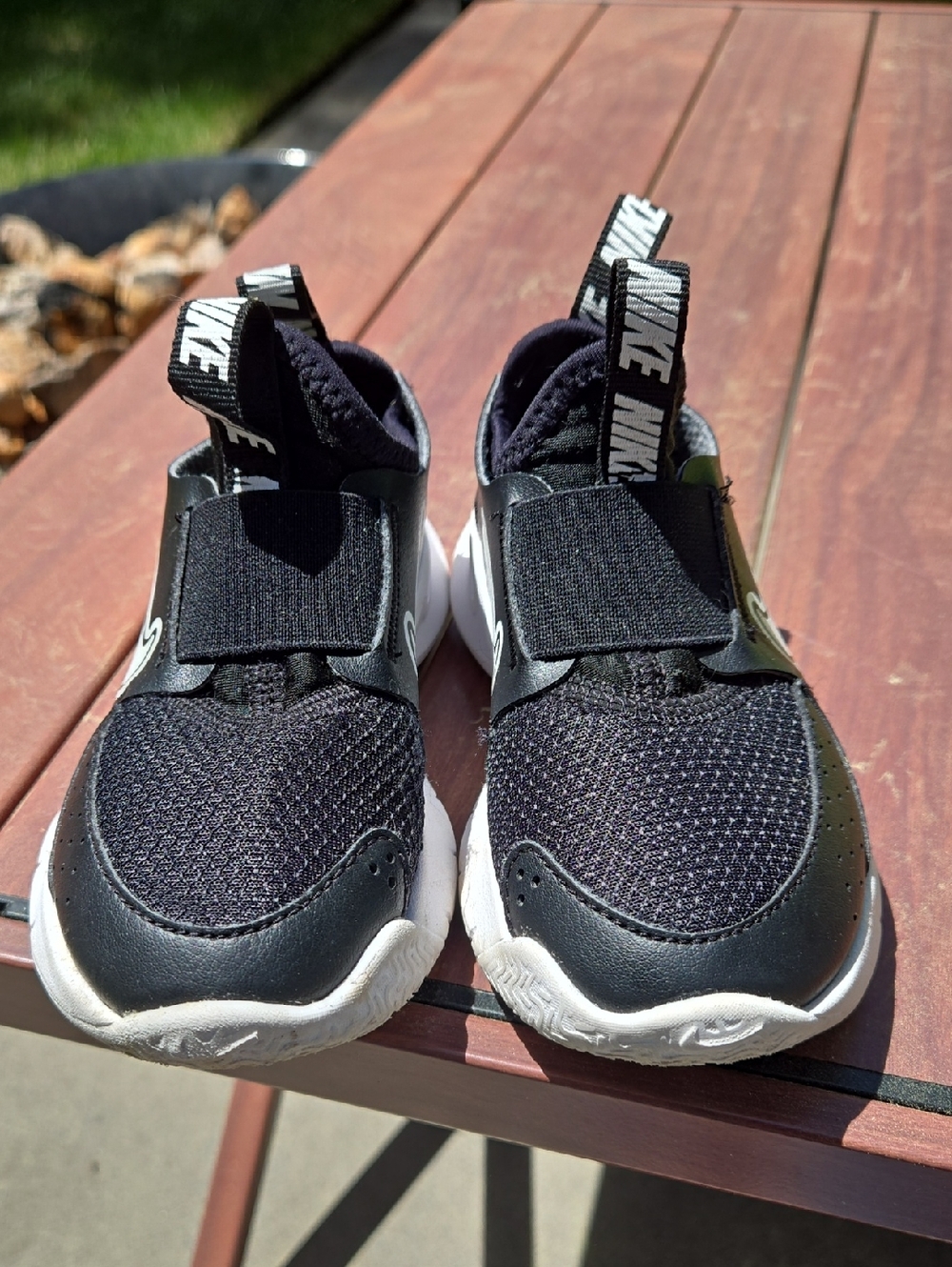 Nike Kids Black and White Size 8C Slip-On Sneakers